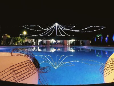 Jardines luna noche piscina